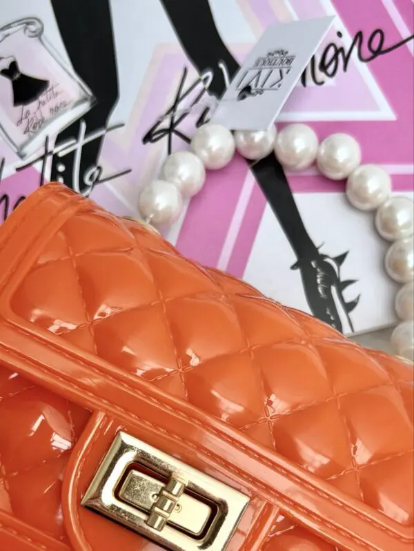 Rankinė su perliukais - orange