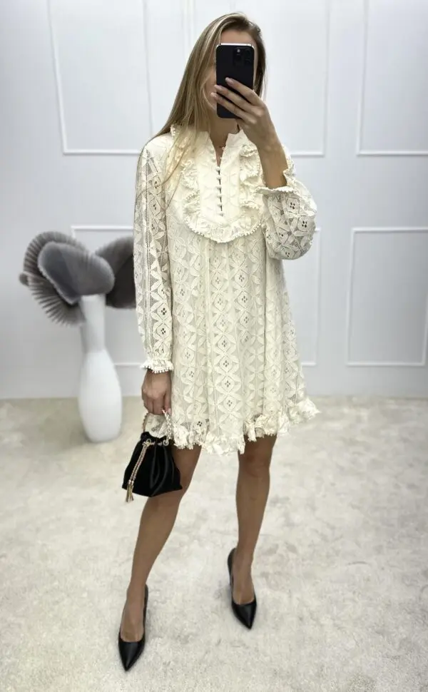 Ypatingo grožio kreminės spalvos suknelė