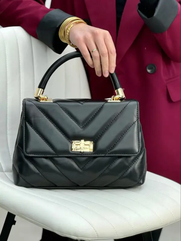 Stilinga klasikinio modelio rankinė