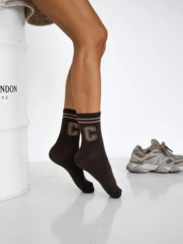 Stilingos kojinės su C raide akcentu