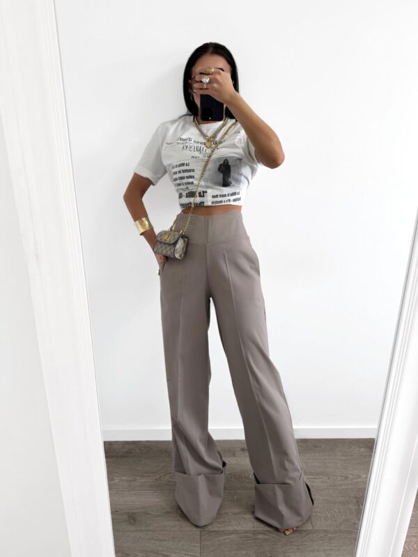 Platėjančios kelnės